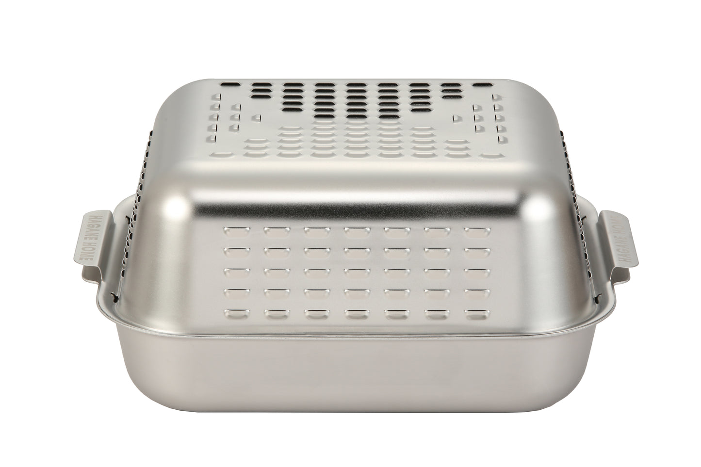 The Hagane Roasting Pan With Functional Anti Spatter Guard: the only stainless steel roasting pan of its kind. Innovative design.