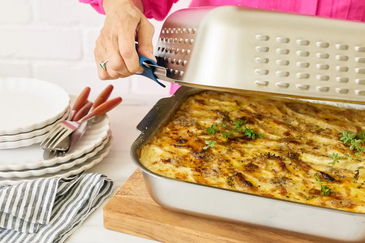 Ultimate Potato Bake made in the Hagane Home Ultimate Roaster. A versatile pan that can be used on all stovetops including induction. Use it as a frying pan, roasting pan, sheet pan, serving dish.