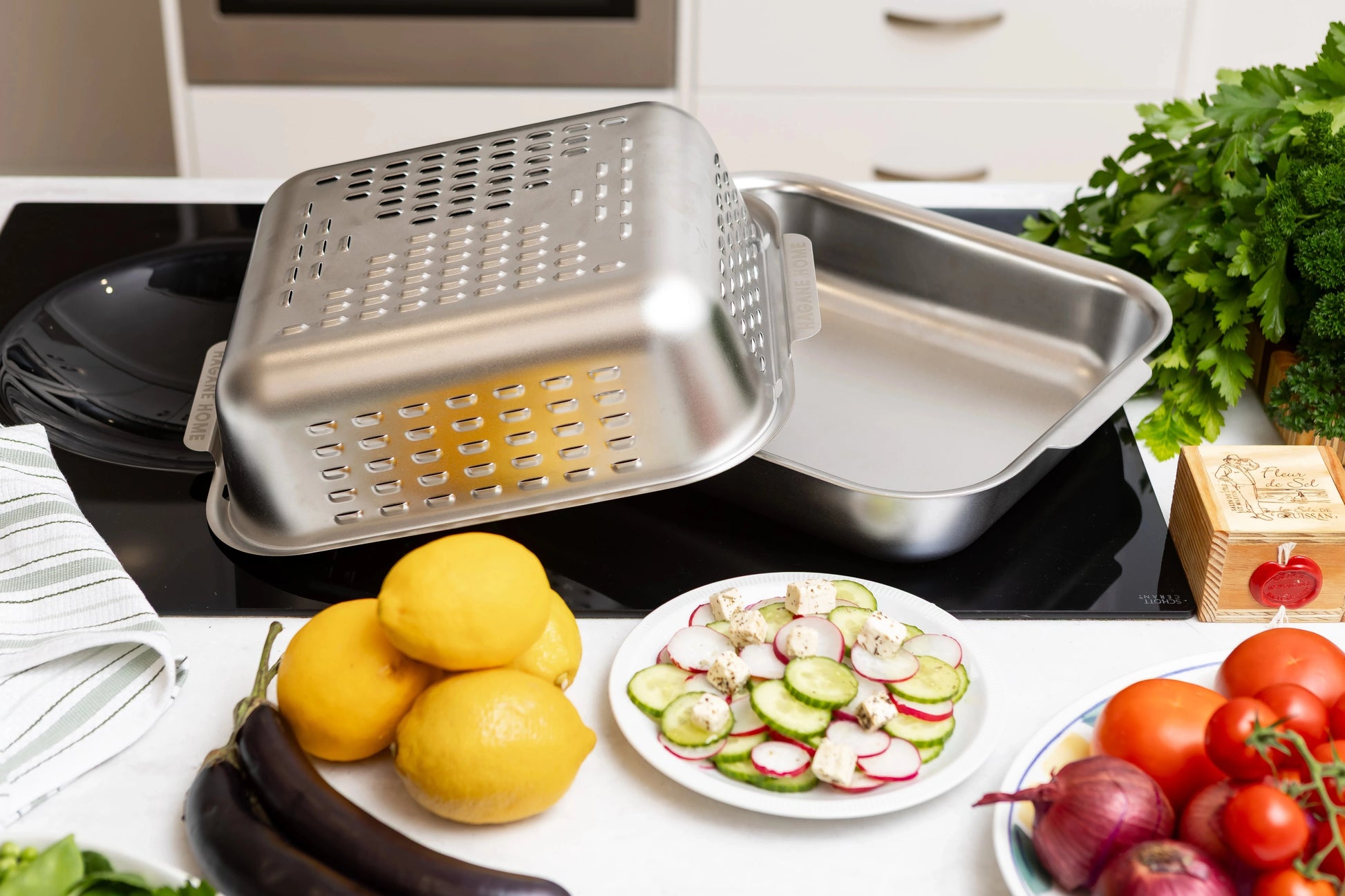 Premium stainless steel roasting pan made to the highest standards. Thoughtfully designed. Game-changing roasting pan with a clever vented spatter guard cover that keeps your oven beautifully clean and delivers a golden, juicy roast.