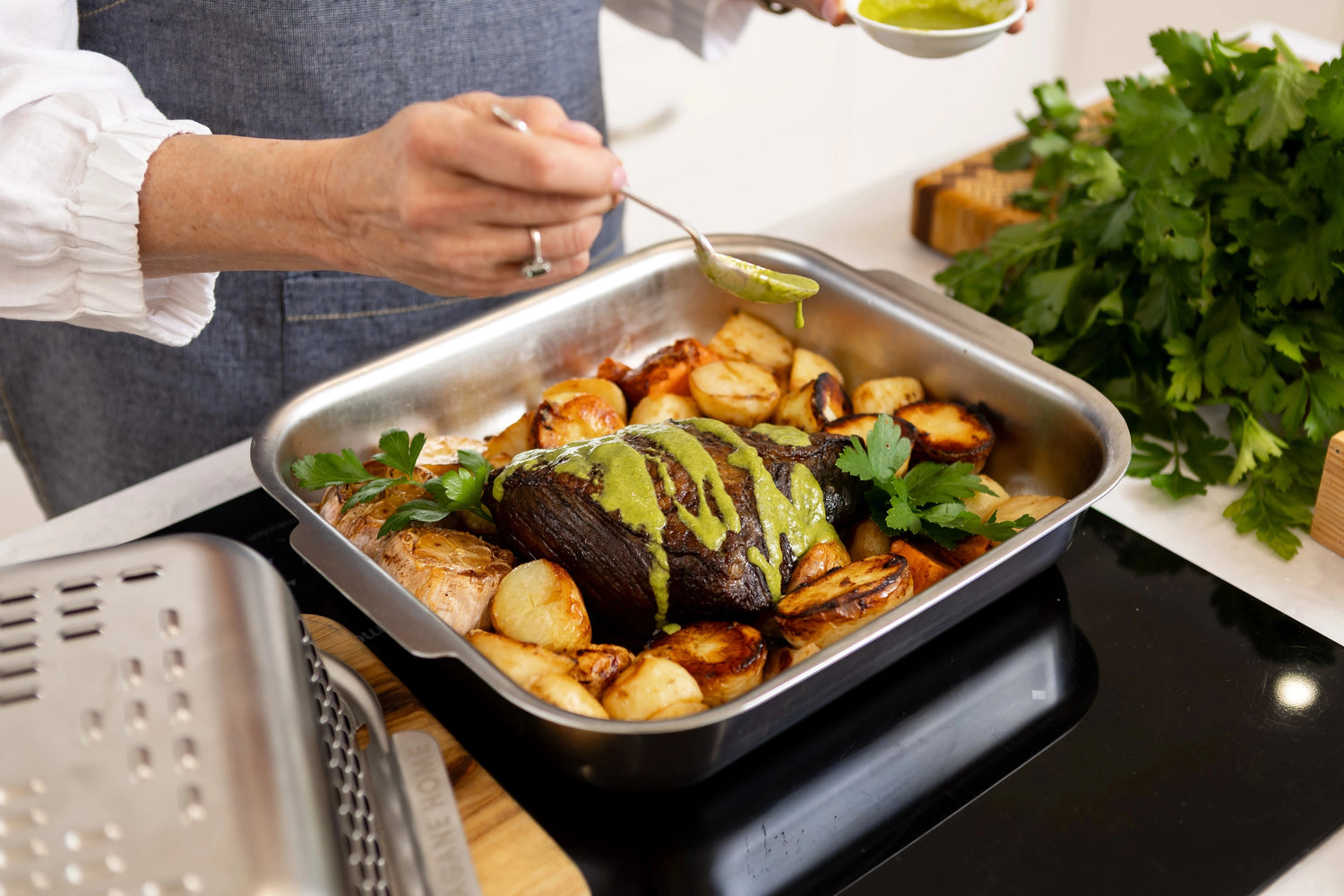 Beef roast for dinner? Cooked to perfection in the Hagane Home Ultimate Roaster. A premium triply stainless steel roasting pan complete with vented spatter guard cover to keep the fat spatters in, let the steam out, and cook a crisp roast.